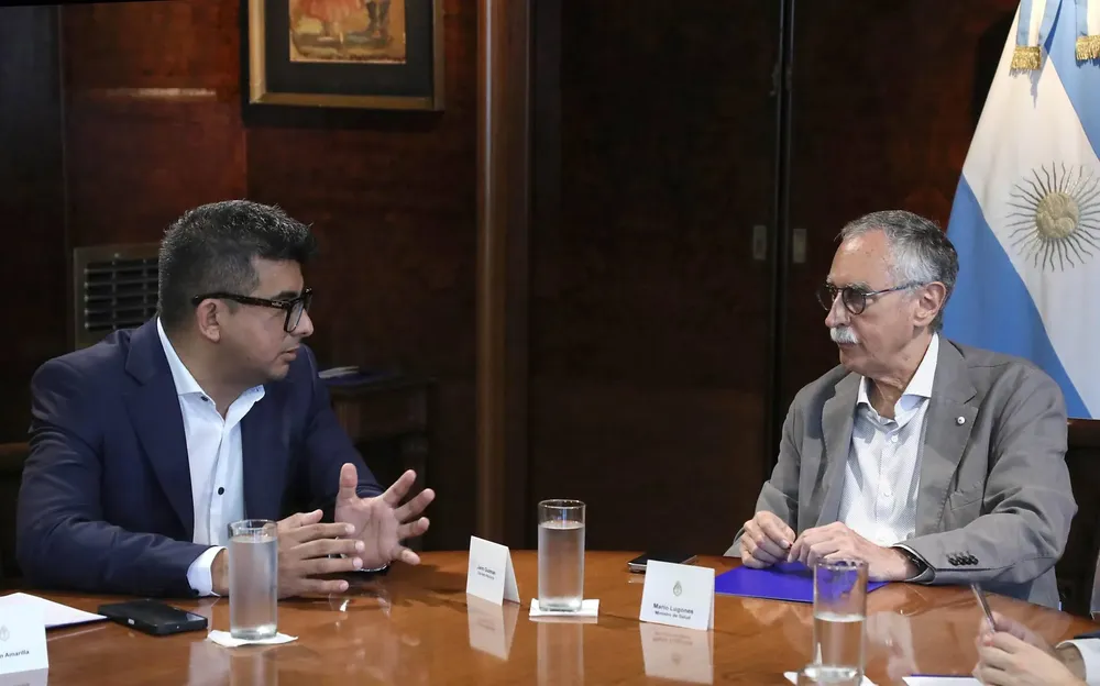 Guzman y el ministro de Salud